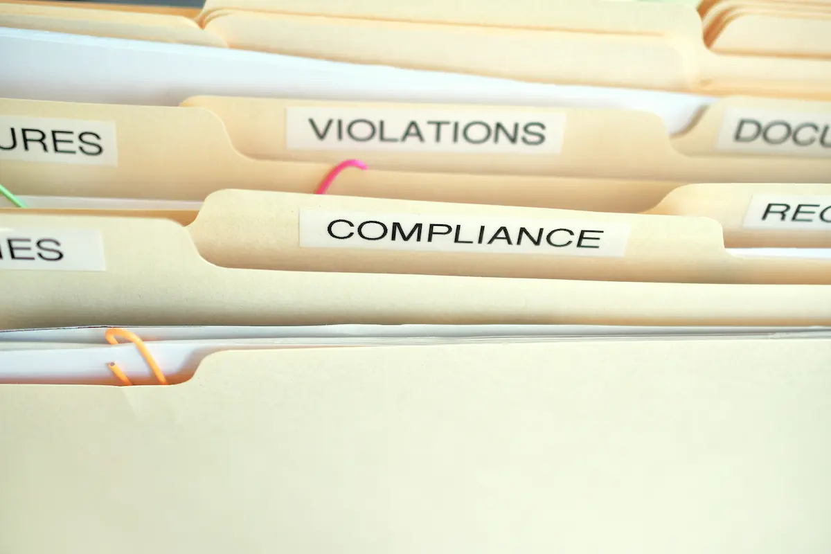 Best private investigator Singapore reviewing compliance files, case documents, and investigation records.